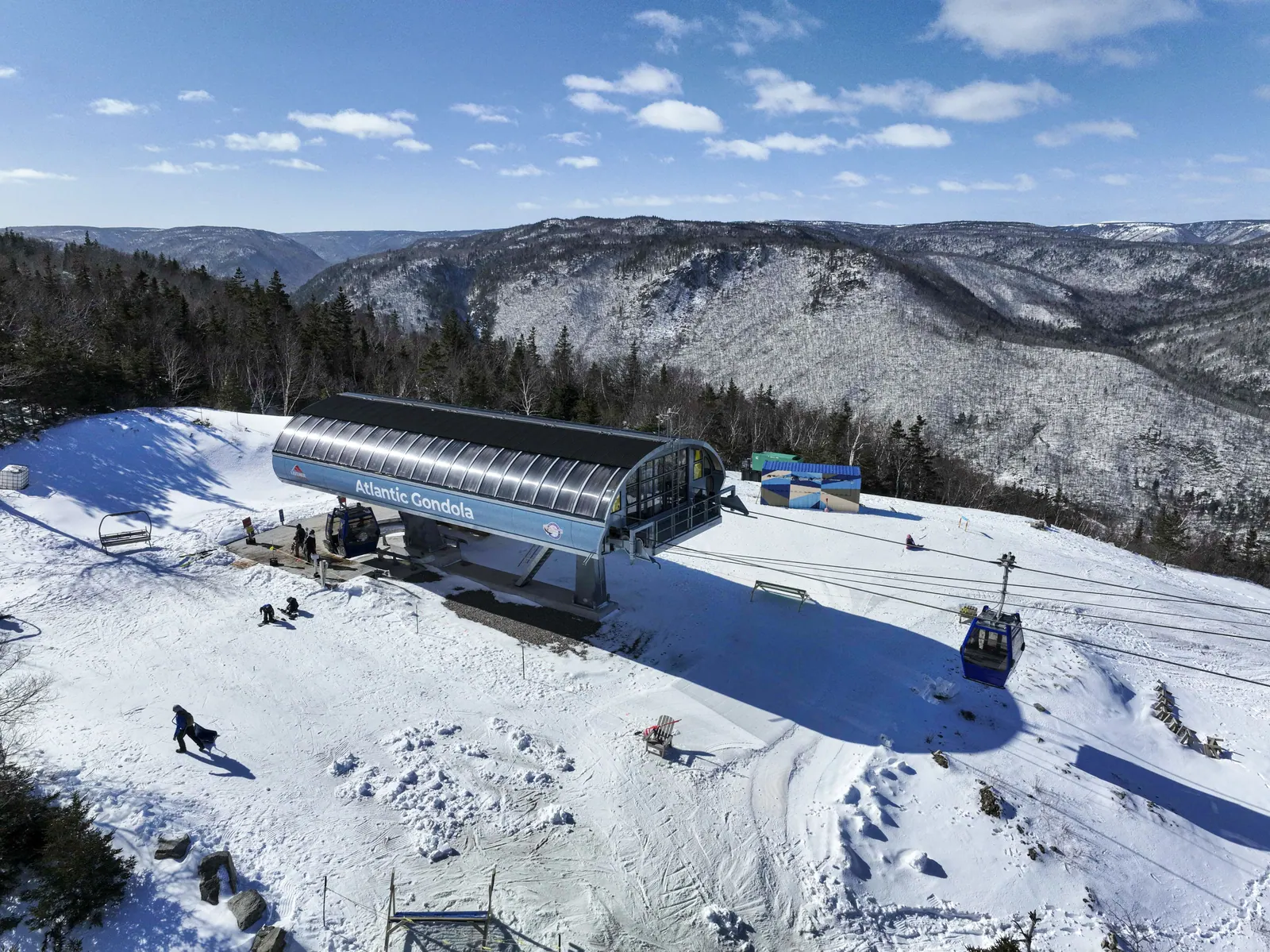 Gondola summit station on the snowy mountaintop above the Cape Breton Highlands