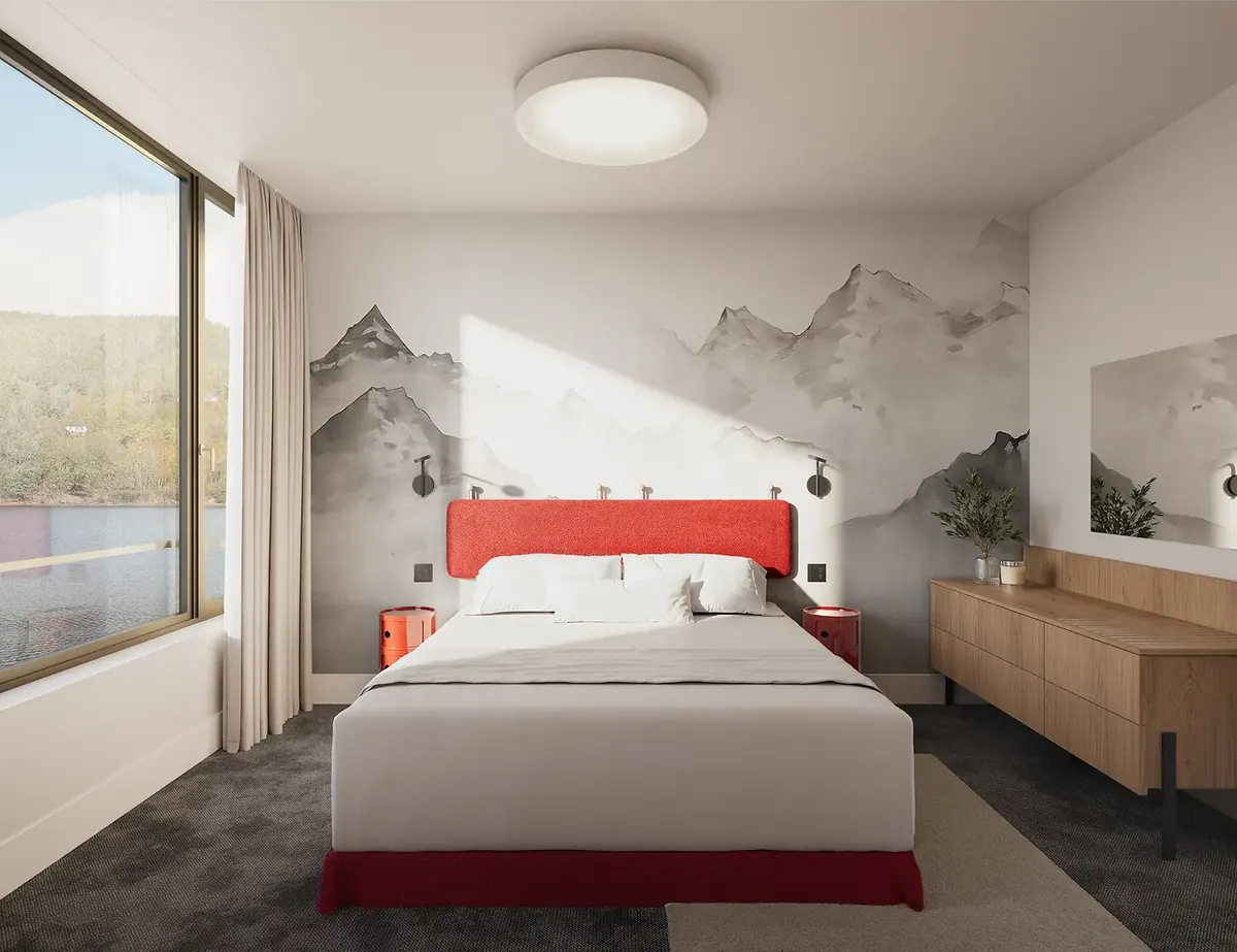 Bedroom with a red upholstered headboard, a misty mountain mural on the wall and oak cabinetry
