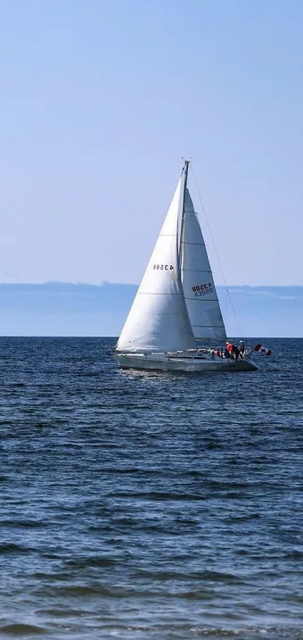 Sailboat under full sail on the open Atlantic