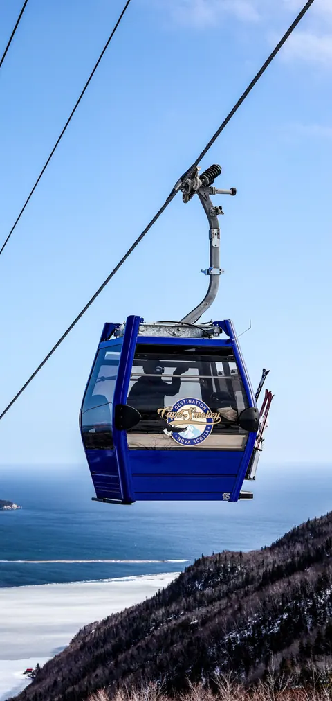 Atlantic Gondola cabin against a blue winter sky
