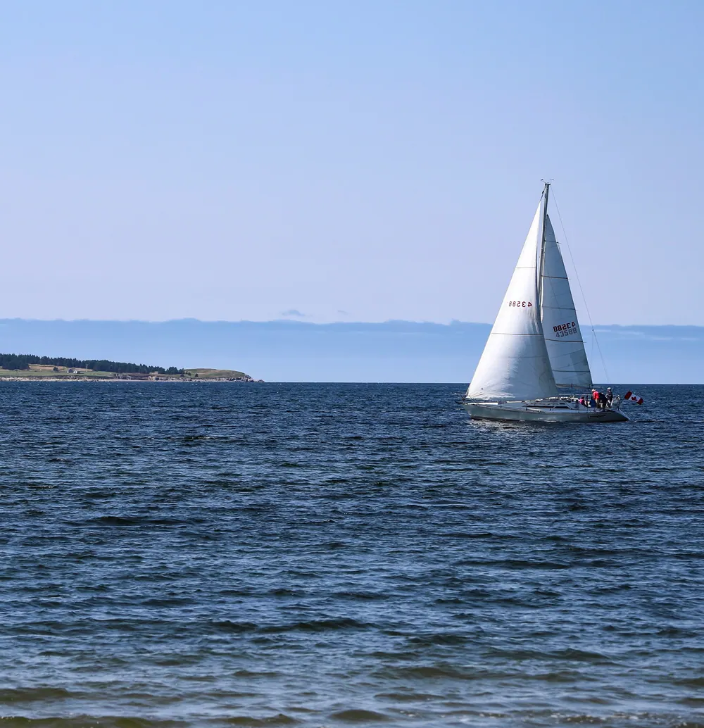 Sailboat under full sail on the open Atlantic